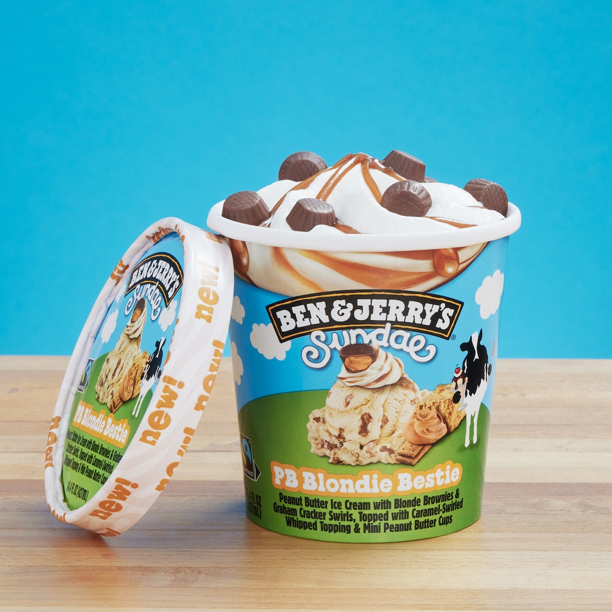Ben & Jerry's PB Blondie Bestie Sundae pint with the lid off so you can see the whipped topping.