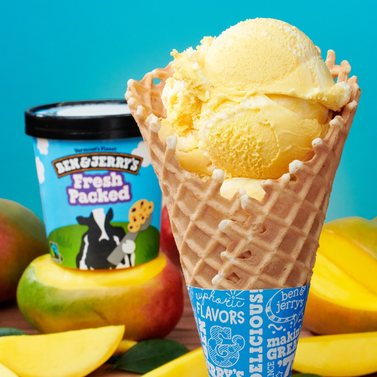 Hands holding a pint of Ben & Jerry's Impretzively Fudged ice cream and a pint of Ben & Jerry's PB S'more ice cream