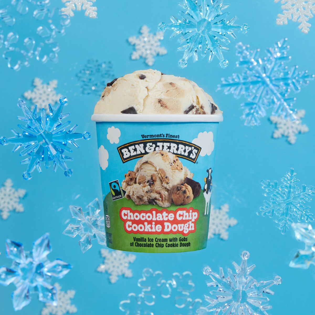 Ben & Jerry's Chocolate Chip Cookie Dough ice cream floating with snowflakes
