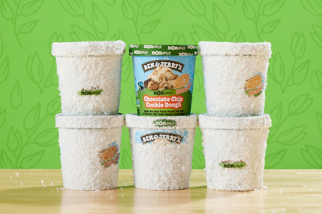 Frosted pints of ice cream on a table top
