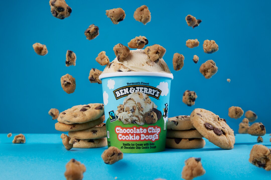 Pint of Ben & Jerry's Chocolate Chip Cookie Dough with floating cookies.