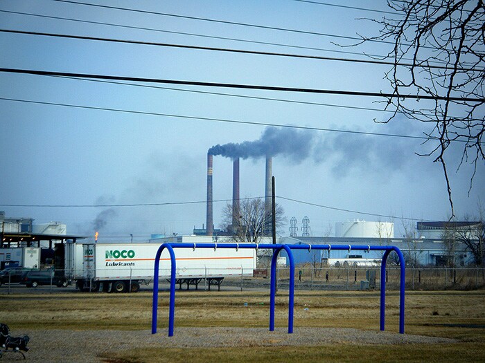 Factory with smokestacks