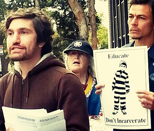 People holding signs