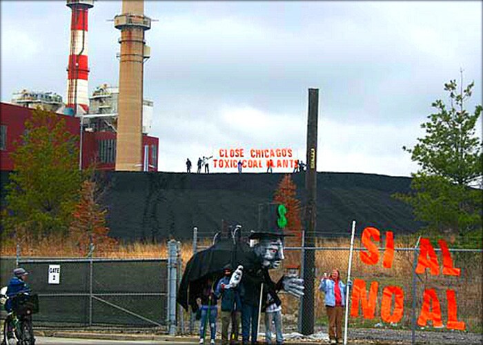 people outside coal plant