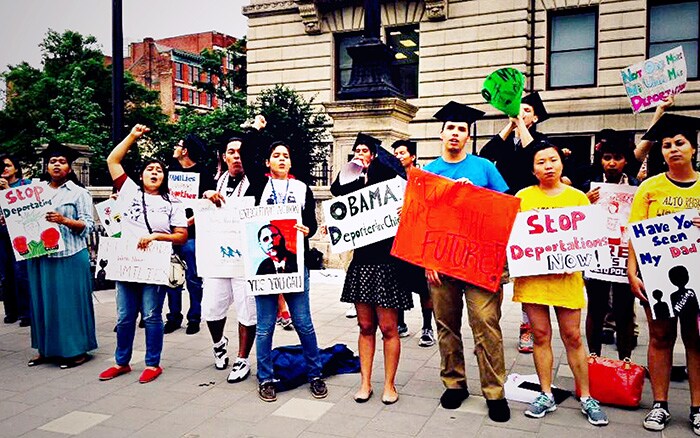 students holding signs