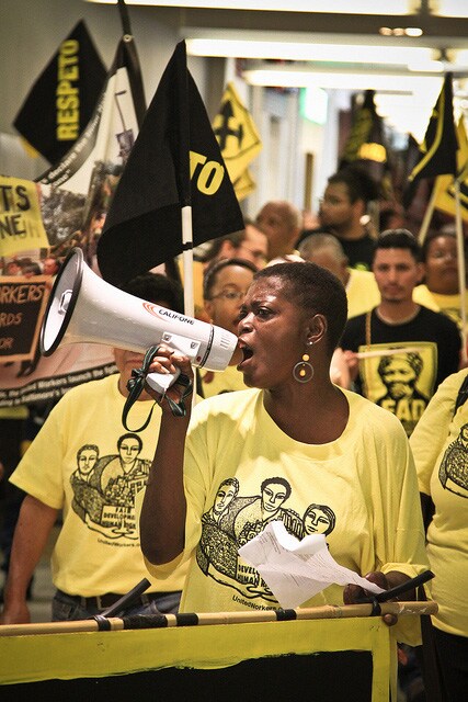woman speaking into megaphone