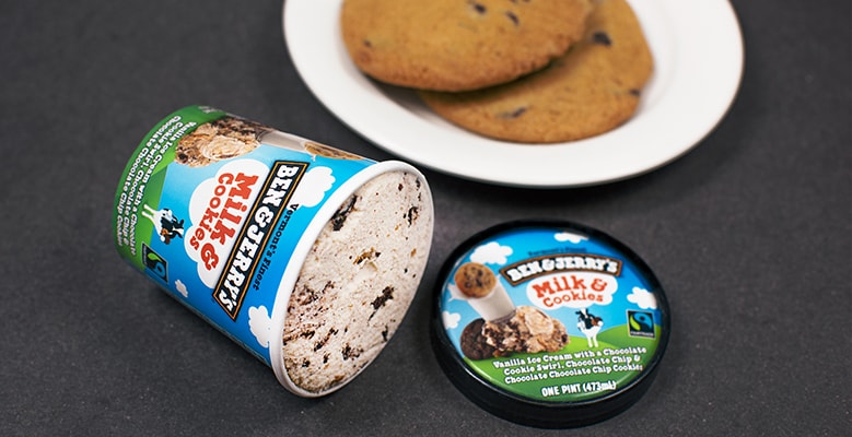 A pint of Milk & Cookies Ben & Jerry's ice cream with a plate of cookies