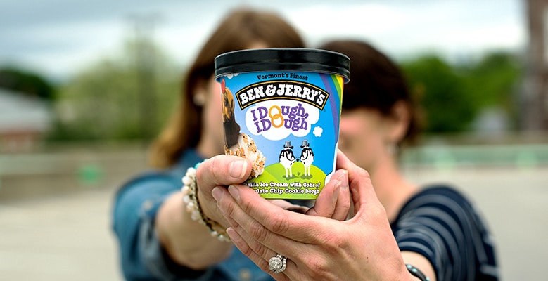 two people holding a pint of I Dough, I Dough