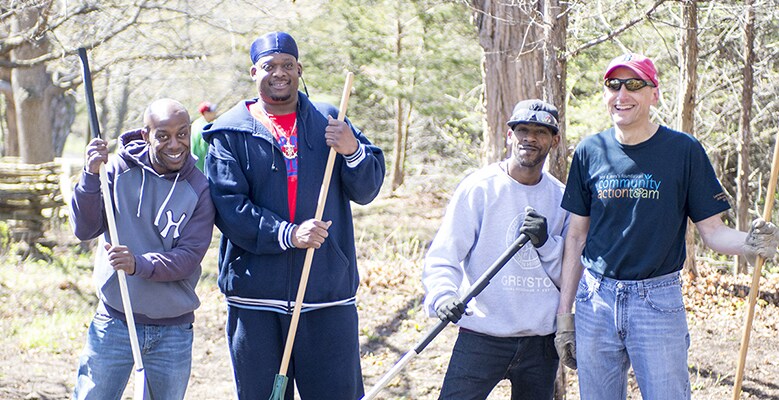 Employees raking things up