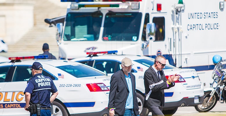 Ben & Jerry being arrested.