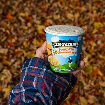 A open pint of Ben & Jerry's Pumpkin Cheesecake