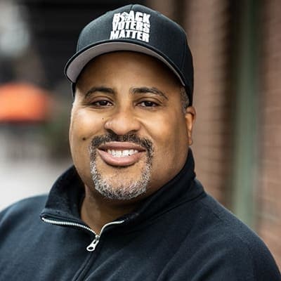 Headshot of the activist Cliff Albright