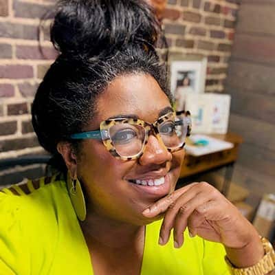 Headshot of the activist DeJuana Thompson.