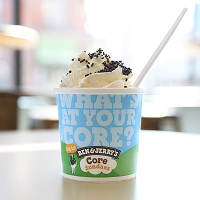 A Ben & Jerry's Core Sundae with a spoon in it.