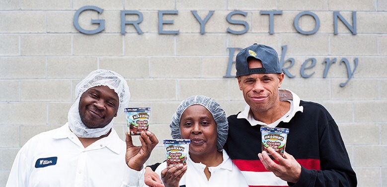 Greyston Bakery Employees holding up Ben & Jerry's Ice Cream