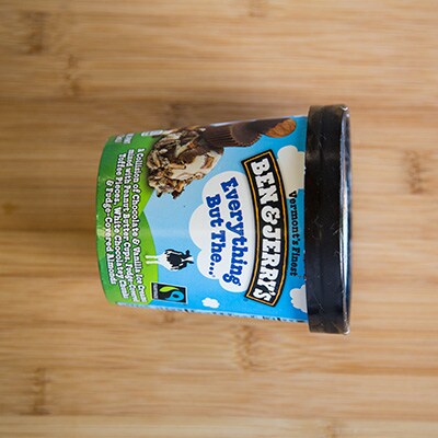 A Picture of a pint of Ben & Jerry's ice cream on its side