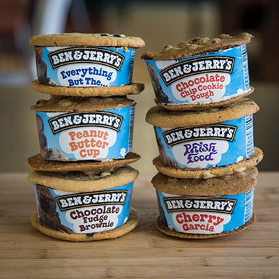 A picture of 6 ice cream sandwiches still with the wrapper on