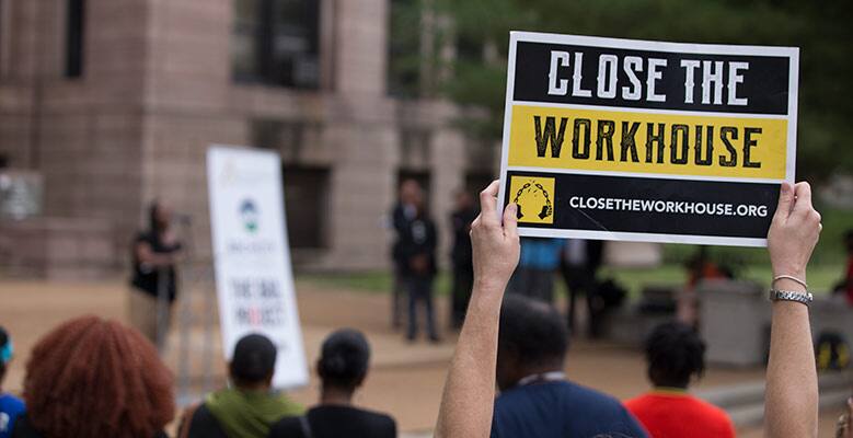 Protest sign at a rally to close the workhouse jail
