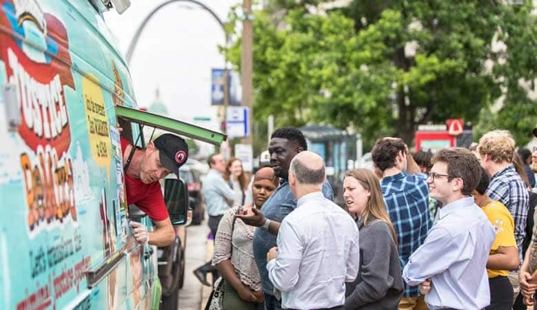 Fans get free scoops at a Ben & Jerry's tour stop in St. Louis