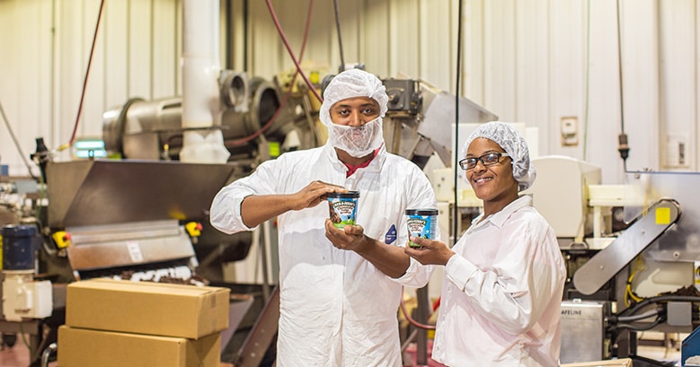 Bakers at Greyston Bakery showing pint of Ben & Jerry