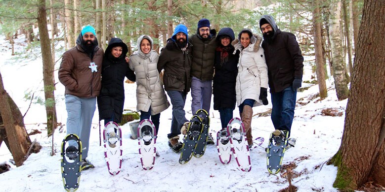 A group of people Snowshoe at Ben & Jerry's Factory