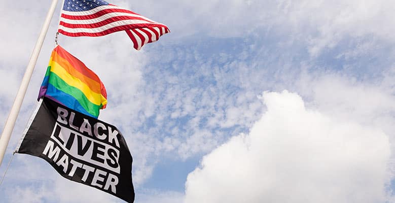 Flags at the Ben & Jerry's headquarters, including a Black Lives Matter flag